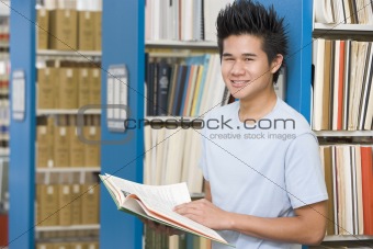 University student working in library