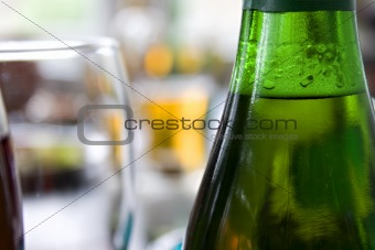 Close up picture of bottle of beer and glass