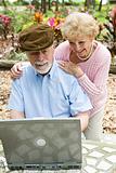 Senior Couple on Computer - Vertical