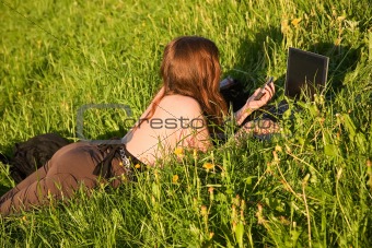 Girl,grass,laptop