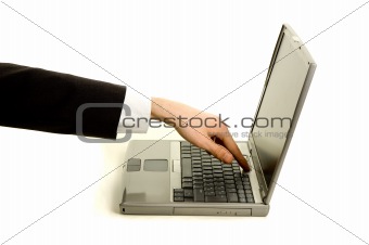 Businessman switching the laptop on
