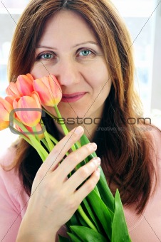 Mature woman with flowers