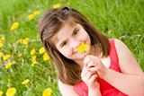 Girl Smelling Flower
