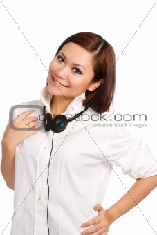 woman feeling happy with headphone hanging on her neck