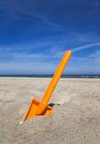 Orange plastic beache spade