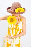 Girl holding sunflower