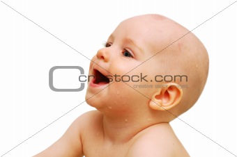 Portrait of smiling baby, close-up, isolated on white