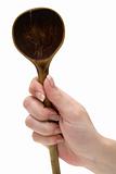 Holding a Used Wooden Spoon