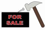 hammer putting up for sale sign