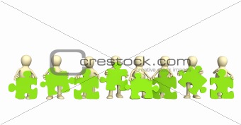 Eight puppets, holding in hands a puzzle of green color