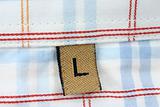 real macro of clothing label - SIZE L