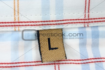 real macro of clothing label - SIZE L