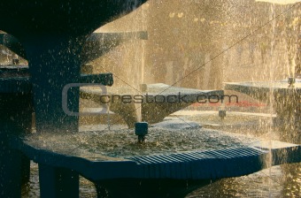 fountain against bright sun