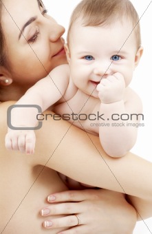 clean happy baby in mother hands
