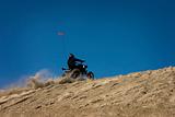 ATV/OHV rider riding sand dunes