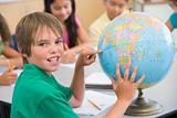 Elementary school pupil with globe