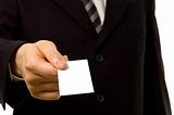 Businessman is giving you a blank business card