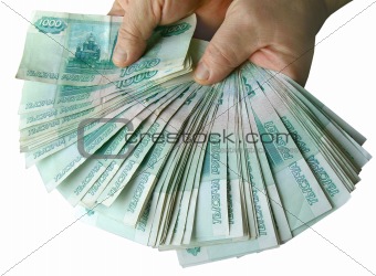 Hands holding many of the Russian banknotes