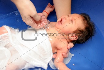 baby girl in a bathtub