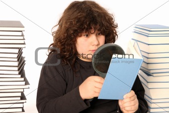 boy reading a book with lens