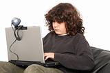 boy using laptop and webcam