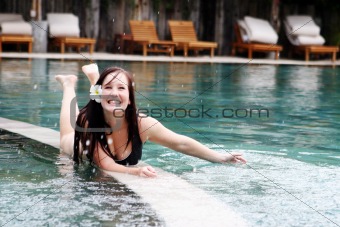 Girl splashing in the water