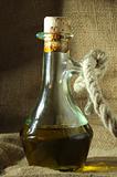 Olive oil with rope and canvas sack