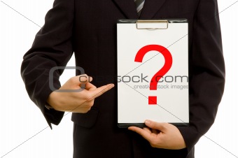 Question mark on clipboard in the hand of a businessman