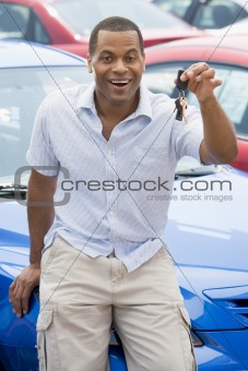 Man picking up new car