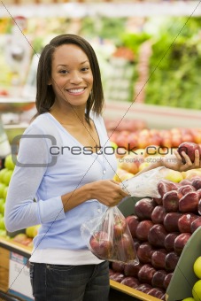 Young woman shopping for fresh produce