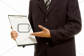 Businessman holding a blank clipboard