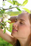 Girl with apple tree flowers