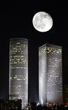 Azriely towers under the moonlight