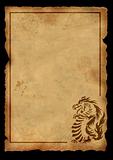 Sheet of ancient parchment with the image of a dragon