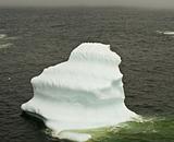 Iceberg and the foggy sea