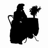 Silhouettes of the man and the woman in clothes of XIX century