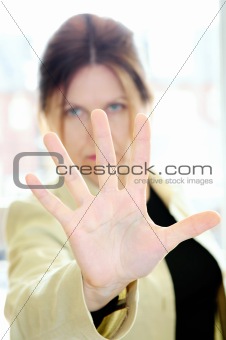 Mature woman gesturing stop