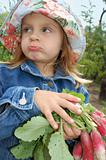 little girl with radishes
