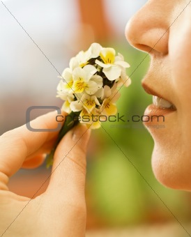 Woman smelling the flowers