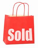 bag with white sold sign 