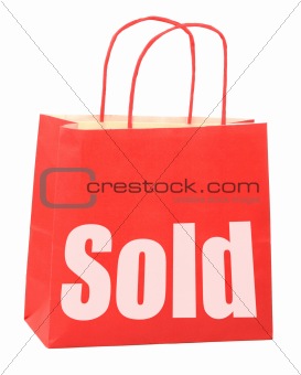 bag with white sold sign 