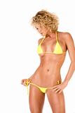 Hot blond girl in yellow bikini