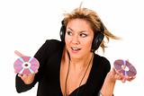 woman listening music in headphones and holding two CD