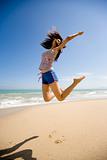 young woman jumping happily