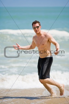 hunk having fun at the beach
