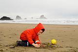 boy playing on beach, Oregon Coast