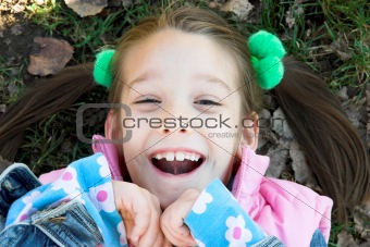 child relaxing in the park