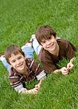 Boys Laying in Grass