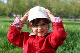 little girl happy smiling in spring park