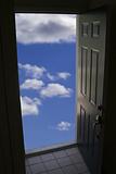 door with clouds